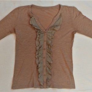 Light pink/tan blouse with a ruffle down the front